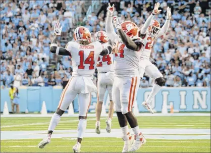  ?? Chris Seward / Associated Press ?? Junior Nyles Pinckney (44), is one of four new starters along the defensive line for Clemson in 2019. The four players who started along the defensive front for last year’s national champions are now all playing in the NFL. Pinckney and this year’s Tigers are off to a 5-0 start, thanks to a rebuilt defensive front that has elevated their play in critical situations.