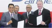  ?? BBXPIX ?? ATS Global Travel and Charter CEO Azize Othman (left) and Bellew (right) at the MoU signing ceremony in Kelana Jaya yesterday.