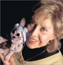  ?? Brian Vander Brug Los Angeles Times ?? ‘I’M ALL MOUTH’ June Foray holds a doll of Rocky the Flying Squirrel, one of the many animated characters she gave voice to during a long career that also included credits in films from “Cinderella” to “Jaws.”