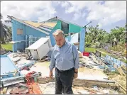  ?? JACQUELINE CHARLES / MIAMI HERALD / TNS ?? United Nations Secretary General Antonio Guterres tours the island of Barbuda in the eastern Caribbean a month after it was decimated by Hurricane Irma’s Category 5 winds and rains.