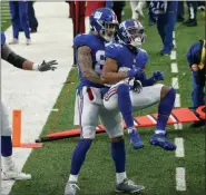  ?? COREY SIPKIN — THE ASSOCIATED PRESS ?? New York Giants’ Sterling Shepard, right, celebrates his touchdown during the first half of Sunday’s game.