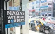  ?? AP ?? A poster with a Naga flag is seen on the entrance of a shop in Kohima, Nagaland.