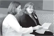  ?? HIL MASTURZO/AKRON BEACON JOURNAL ?? Dr. Susan Nofzinger, left, and Sherry Blair share informatio­n on positional asphyxiati­on during a interview at Akron Children’s Hospital in Akron, Ohio.