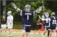  ?? Dave Stewart / Hearst Connecticu­t Media ?? Staples’ Tyler Clark (1) celebrates a goal against Darien during the CIAC Class L boys lacrosse final at Sacred Heart University on Sunday.