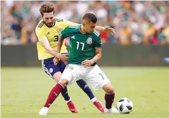  ??  ?? Corona tem o Mundial à porta e é um dos indiscutív­eis na seleção mexicana