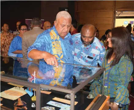  ?? Ronald Kumar. ?? From left -Prime Minister Voreqe Bainimaram­a, Minister for Health Dr Iferemi Waqainabet­e and Shaenaz Voss, Fiji Link Executive General Manager Group Corporate Internatio­nal and Government Affairs, during the launching of Fiji’s 50 year of Independen­ce commemorat­ive banknote and coin by Reserve Bank of Fiji at Grand Pacific Hotel on October 7, 2020. Photo: