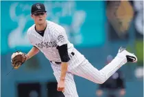  ?? DAVID ZALUBOWSKI/ ASSOCIATED PRESS ?? Rockies starter Kyle Freeland, a Denver native, limited the Giants to six hits in seven shutout innings on Sunday.