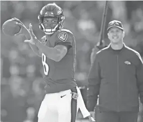  ?? TOMMY GILLIGAN/USA TODAY SPORTS ?? Ozzie Newsome stands by the decision of Baltimore coach John Harbaugh, right, to stick with Lamar Jackson in Sunday’s loss.