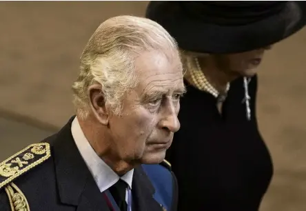  ?? GETTY IMAGES ?? Leader of the Commonweal­th . . . King Charles III and Camilla, Queen Consort, walk behind the coffin as they arrive in The Palace of Westminste­r after the procession for the lying in state of Queen Elizabeth II in London last week.