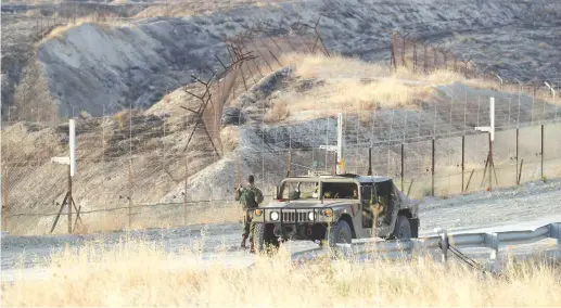  ?? ( Ammar Awad/ Reuters) ?? IDF SOLDIERS are seen in the Jordan Valley last year.