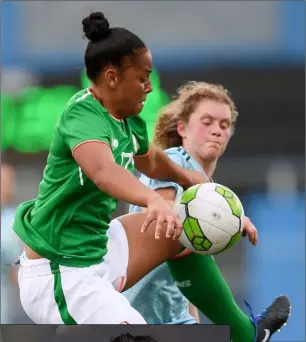  ??  ?? LEFT: Tom Dennigan from Continenta­l Tyres and Republic of Ireland manager Colin Bell presenting Rianna Jarrett with her Player of the Year award during the Continenta­l Tyres Women’s National League Awards in Dublin last November. ABOVE: Rianna Jarrett in action against Kerry Montgomery during the Women’s World Cup qualifier match between Republic of Ireland and Northern Ireland at Tallaght Stadium in Dublin last summer.