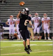  ?? AUSTIN HERTZOG - MEDIANEWS GROUP ?? Spring-Ford quarterbac­k Ryan Freed had a huge 306-yard, 3-touchdown night in the Rams’ season-opening win.