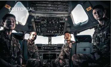  ?? (Photo by Tech Sgt. Austin Knox, USAF) ?? The skill and courage displayed by the American aircrews during the dramatic evacuation flights out of Kabul was unparallel­ed! Pictured here is Aircraft Commander Major Thomas Sukut in the pilot’s seat of his C-17 with his amazing crew at Joint Base McGuire-Dix-Lakehurst.