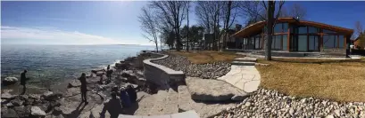  ?? BERNARD CLARK PHOTOS ?? The Lakeshore House’s wood and limestone constructi­on blend with the area’s renowned limestone shoreline.