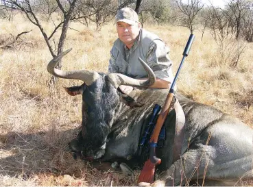  ??  ?? With the correct ammunition the .303 is as good a cartridge for hunting today as it ever was. Ren Lubbinge’s sporterise­d Lee-Enfield loaded with Winchester factory ammunition dropped this beautiful blue wildebeest bull in its tracks.