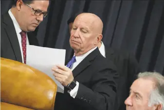  ?? Mark Wilson / Getty Images ?? Rep. Kevin Brady, R-Texas (center), head of the House Ways and Means Committee, says his chamber won’t go along with the Senate’s proposal to end the deduction for property taxes.