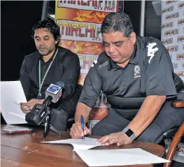  ?? Photo: ?? From left: FBC chief executive officer Riyaz Sayed-Khaiyum and Fiji FA president Rajesh Patel seal the deal during a press conference in Suva on July 8, 2020.