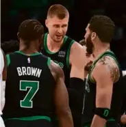  ?? FILE/CHARLES KRUPA/ASSOCIATED PRESS ?? Celtics coach Joe Mazzulla has lauded Jayson Tatum (right) and Jaylen Brown for welcoming in Kristaps Porzingis.