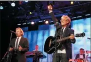  ?? PHOTO BY MATT SAYLES — INVISION FOR THE SOCIETY OF SINGERS — AP IMAGES ?? Dewey Bunnell, left, and Gerry Beckley, of the band America, perform at The Society of Singers’ 21st ELLA Awards on Thursday in Beverly Hills America will perform at the Stanley in Utica on Friday at 7:30p.m.