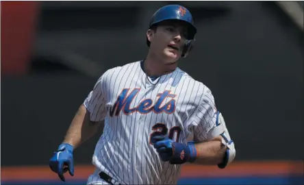  ?? MARK LENNIHAN ?? New York Mets’ Pete Alonso rounds the bases with a two-run home run against the Miami Marlins in the first inning of a baseball game, Wednesday, Aug. 7, 2019, in New York.