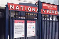  ?? Jacquelyn Martin / Associated Press ?? Nationals Park is closed after the opening-day game against the Mets was postponed because of coronaviru­s concerns Thursday.