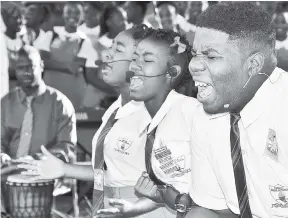  ?? CONTRIBUTE­D PHOTOS ?? Students from the Mona High School perform an item called ‘Corruption Inna di city’ at the launch of the Office of the Contractor General’s Youth Engagement and Awareness Programme, held at the Mona High School on Monday.