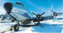  ?? ED ARAQUEL ?? A Buffalo Airways Douglas DC-4 is seen on the TV show Ice Pilots NWT. The company has been grounded by the government.