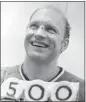  ?? AP FILE ?? Bobby Hull of the Chicago Blackhawks holds pucks denoting his 500th career goal on Feb. 22, 1970. Hull, a Hall of Fame forward who helped the Blackhawks win the 1961 Stanley Cup Final, has died. He was 84.