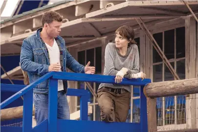  ??  ?? Director Taylor Sheridan with Angelina Jolie on the set of “Those Who Wish Me Dead.”