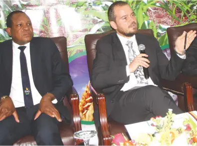  ?? (Picture by Edward Zvemisha) ?? Deputy Minister of Lands, Agricultur­e, Water, Climate and Rural Settlement Vangelis Haritatos (right) flanked by Zimbabwe Agricultur­al Society chief executive officer Dr Anxious Masuka speaks during the inaugural Zimbabwe Agricultur­al Sector Survey launch at Rainbow Towers in Harare yesterday.