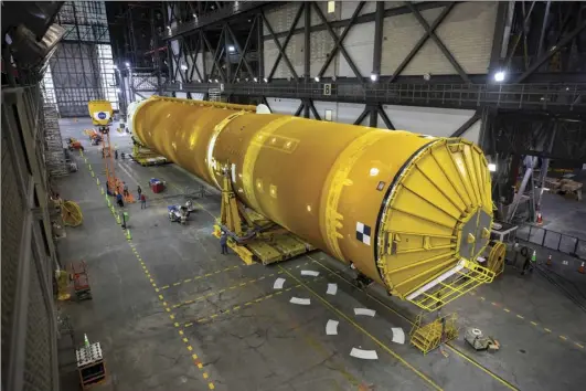  ?? NASA/Kim Shiflett ?? The Space Launch System (SLS) core stage is seen in the transfer aisle of the Vehicle Assembly Building (VAB) at NASA’s Kennedy Space Center in Florida on June 9, 2021.