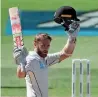  ?? AFP ?? Kane Williamson celebrates his ton during day three of the first Test against Bangladesh. —