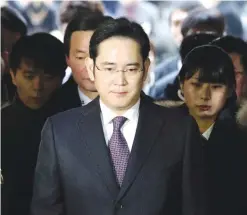  ??  ?? SEOUL: In this file photo, Lee Jae-yong, front, a vice chairman of Samsung Electronic­s Co. arrives for the hearing at the Seoul Central District Court in Seoul, South Korea. —AP