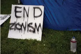  ?? Photograph: David Ryder/Reuters ?? A sign in a pro-Palestinia­n encampment at The Evergreen State College in Olympia, Washington, on 28 April 2024.