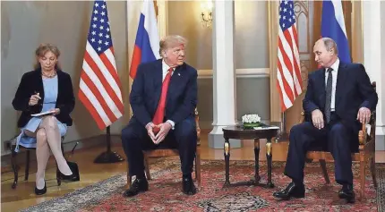  ?? BRENDAN SMIALOWSKI/AFP/GETTY IMAGES ?? Trump’s interprete­r, Marina Gross, was in the room when President Donald Trump and Russian President Vladimir Putin met privately for two hours last week in Helsinki.
