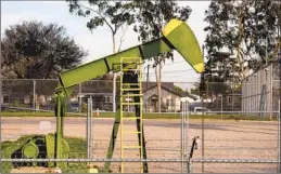  ?? Jay L. Clendenin Los Angeles Times ?? AN OIL DERRICK pump at the Wilmington Athletic Complex in 2022.