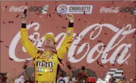  ?? CHUCK BURTON — THE ASSOCIATED PRESS ?? Kyle Busch celebrates after winning the Monster Energy Cup Series race May 27 at Charlotte Motor Speedway.