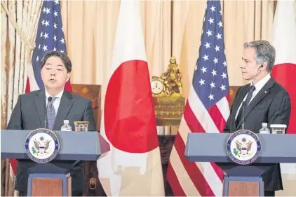  ?? REUTERS ?? US Secretary of State Antony Blinken listens as Japan’s Foreign Minister Yoshimasa Hayashi speaks during a press conference as part of the 2023 US-Japan Security Consultati­ve Committee meeting at the State Department in Washington on Wednesday.