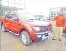 ?? Picture: SUPPLIED ?? Sales consultant, Reveriano Kanavakati­ni with Ford Ranger 3.2L “Wildtrak” at Shreedhar Motors yard Vatuwaqa, Suva.