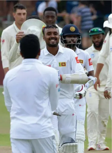  ?? Picture: AFP ?? AGAINST ODDS: Sri Lanka's Oshada Fernando is all smiles after victory in the second Test against South Africa at St George's Park Stadium in Port Elizabeth on Saturday.