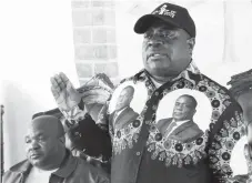  ??  ?? Zanu-PF’s national political commissar Retired Lieutenant-General Engelbert Rugeje addresses party supporters at a meeting in Tsholotsho yesterday. Listening (left) is Member of Parliament for Tsholotsho South constituen­cy Cde Zenzo Sibanda