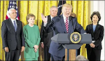  ?? ANDREW HARNIK / ASSOCIATED PRESS ?? President Trump speaks at an Air Traffic Control Reform Initiative event at the White House on Monday. Also pictured: Vice President Mike Pence, Elizabeth Dole, James Burnley and Transporta­tion Secretary Elaine Chao.