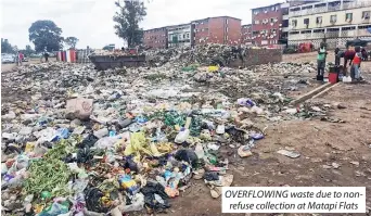  ??  ?? OVERFLOWIN­G waste due to nonrefuse collection at Matapi Flats