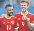  ?? FOTO: DPA ?? Guter Dinge: Alexander Samedov und Fedor Smolov (re.).