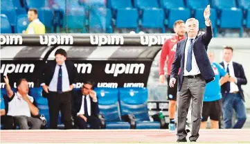  ?? — AFP photo ?? In this file photo taken on August 18, 2018 Napoli’s head coach Carlo Ancelotti gives instructio­ns during the Italian Serie A football match Lazio vs Napoli at the Olympic stadium in Rome.