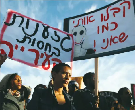  ??  ?? ISRAELIS PROTEST racism in Tel Aviv. An altercatio­n between a soldier and police became a major symbol of racism in Israel last year.