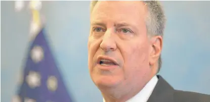  ?? SETH WENIG/AP FILE PHOTO ?? New York Mayor Bill de Blasio defended the law that requires companies to reveal the addresses of hosts and whether they’re renting a room or the full apartment.