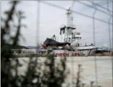  ?? RENATA BRITO — THE ASSOCIATED PRESS ?? In this Wednesday file photo, The Proactiva’s Open Arms rescue boat sits docked in Barcelona, Spain.