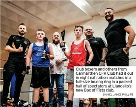  ?? DANIEL JAMES PHILLIPS ?? Club boxers and others from Carmarthen CFK Club had it out in eight exhibition matches in a full-size boxing ring in a packed hall of spectators at Llandeilo’s new Box of Fists club.