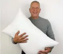  ?? ?? Alexander Miles, inventor of the Gx Pillow pictured with his invention